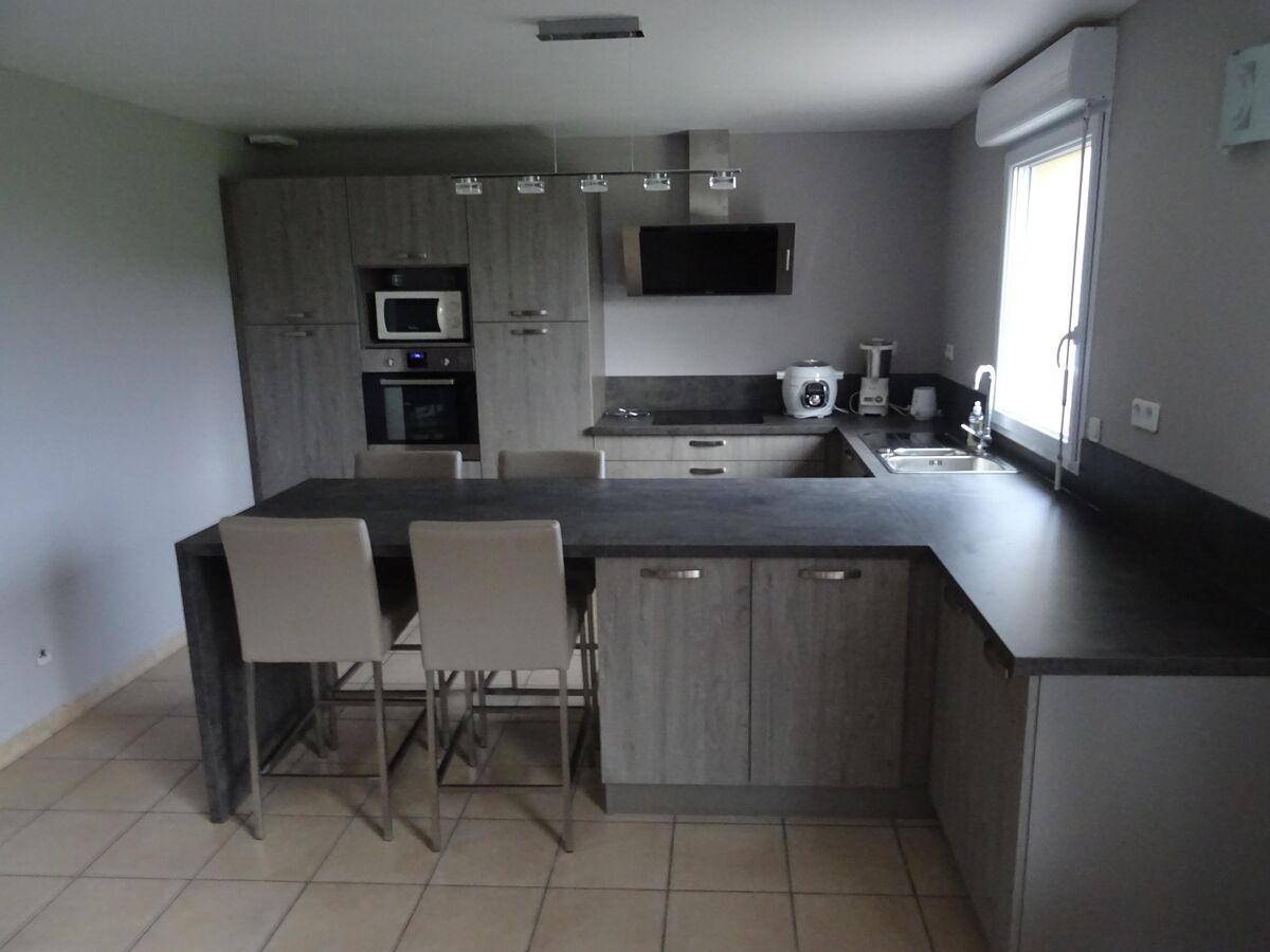 Cuisine équipée sur mesure Label chêne sable synchrone