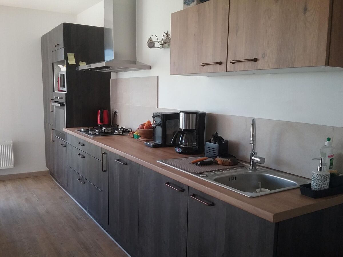 Cuisine avant-après sur mesure Vega Woody Dark et Chêne Honey