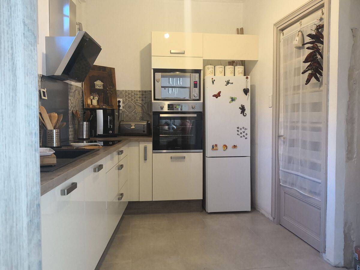 Rénovation cuisine équipée sur mesure Petilla Blanc Brillant